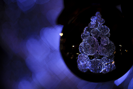 Christmas photo  background, special bokeh effect  with little hearts  on black