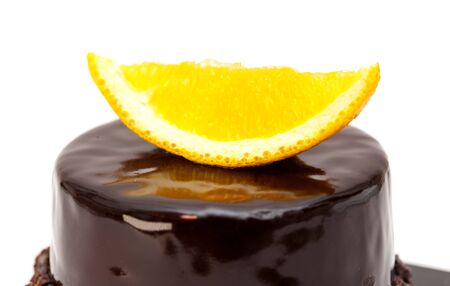 small individual mousse cake with mirror glaze isolated on whiteの写真素材