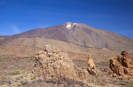 Tenerife, rock formations around Roques Garcia, Teide in the background, morning lightの写真素材