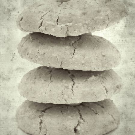 textured stylish old paper background, square, with soft almond cookiesの写真素材