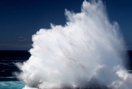 Gran Canaria, north coast, area around Punta Sardina cape, powerful foamy ocean waves breaking along the shoreの写真素材