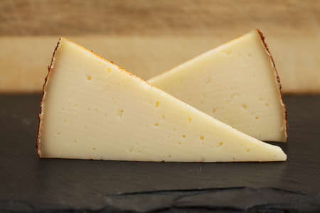 Produce of Canary Islands - semi-cured paprika-covered cheese made of mixture of milks on Gran Canariaの写真素材