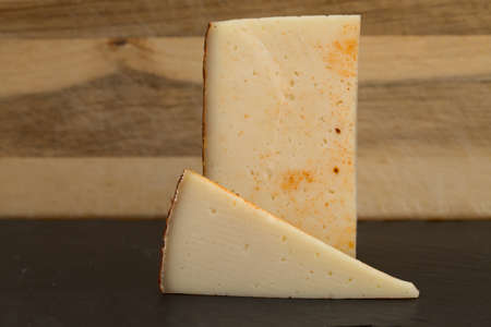 Produce of Canary Islands - semi-cured paprika-covered cheese made of mixture of milks on Gran Canariaの写真素材