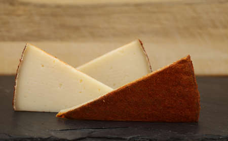 Produce of Canary Islands - semi-cured paprika-covered cheese made of mixture of milks on Gran Canariaの写真素材
