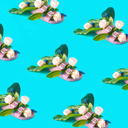 Pattern of summer pink slippers with flowers. Spring flowering. Flowers coming out of a woman's slipper.の写真素材