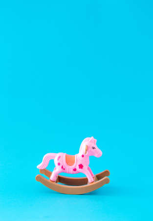 Children's riding horse. Place for text. Minimalism.の写真素材