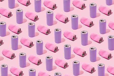 Pattern of Purple and Pink Canned Drinks. Christmas trendy idea for holiday parties. Minimal composition.の写真素材