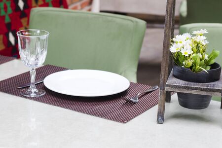 TBILISI, GEORGIA - Restaurant setting table, luxury tableware and dishware on the table. Restaurant...