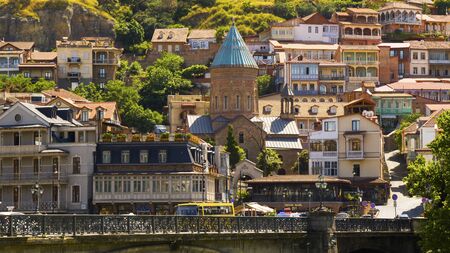 Old town and city center of Tbilisi, Georgia. Famous places and landmarks, old famous church, hill of Narikhala. Trees and sunshine.の写真素材