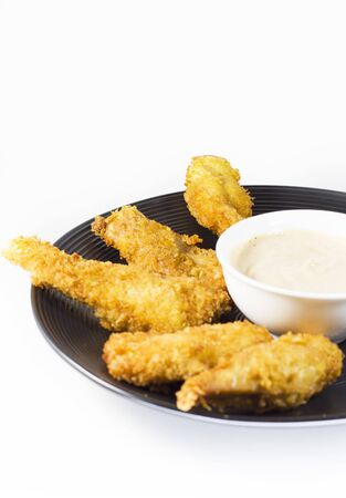 Chicken nuggets on the plate, studio shoot and white backgroundの写真素材