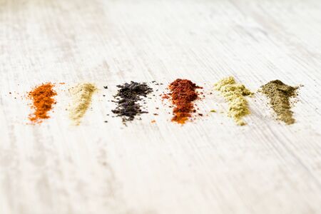 Spaces on the table, red and black pepperの写真素材