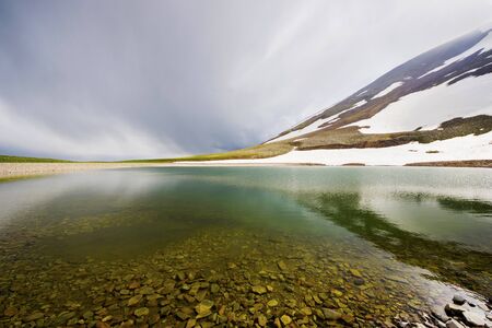 Alpine mountain lake landscape, colorful nature view, Georgian lake, travel destination, hiking place.の写真素材