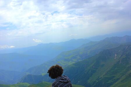 People mountaineering and hiking in Georgia, Mountain landscape and Georgian nature. Travel...