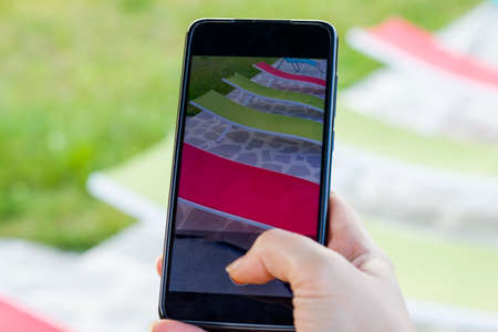 Take photo and video of swimming pool and pink mattress, summertime and empty pool, vacation and...