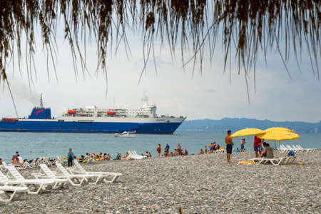 BATUMI, GEORGIA - JULY 07, 2020: Batumi beach situation, people and coastline. summer holidays and vacation.のeditorial素材
