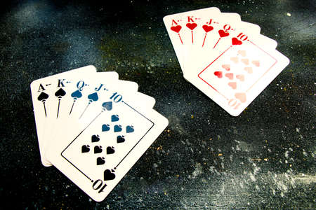 Royal flash  poker and blackjacks cars on the dark background