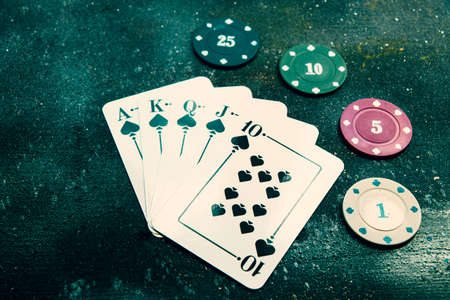 Royal flash  poker and blackjacks cars on the dark backgroundのeditorial素材