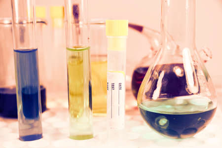 Blood test tube sample without name, empty space for text, laboratory background, copy paste.の写真素材