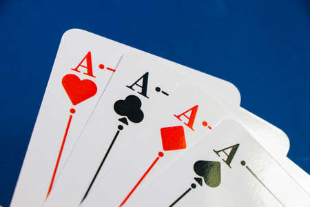 Four aces and chips, card game, cards on the table. Poker and blackjack, play cards.のeditorial素材
