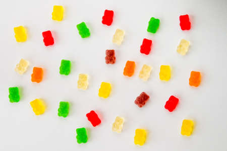 Mixed jelly bear, high angle view of taste sweet snack, colorful bears on the white backgroundの写真素材