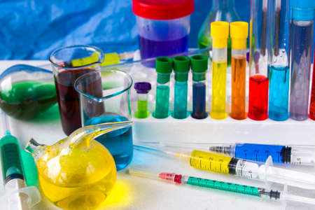 Laboratory instruments, glassware and reagents, colorful liquid chemical elements, research diagnosesの写真素材