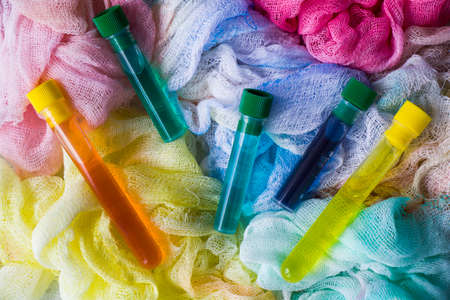 Watercolor cotton clothe and colored water, dye test of cloth, multicolored backdrop