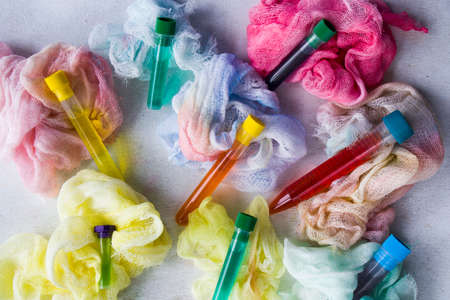Watercolor cotton clothe and colored water, dye test of cloth, multicolored backdrop