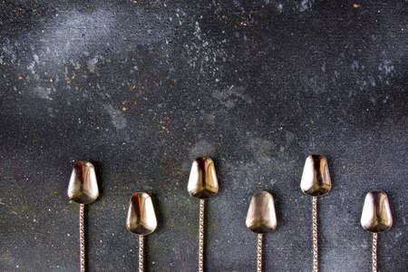 Silverware, silver vintage spoon background, spoon set on the dark background