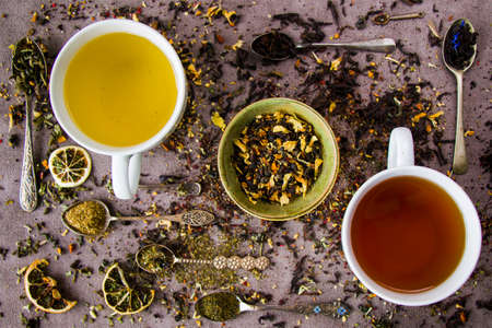 Herbal and natural green and black dry tea set, variation and collection of tea and vintage spoons