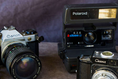 Tbilisi, Georgia - October 07, 2020: Old vintage and retro photo cameras, Cmena, Polaroid and Canonのeditorial素材