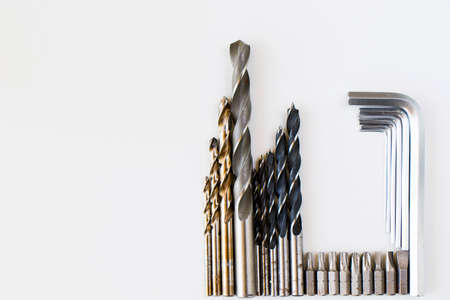 Power and cordless drills and tools heads set and kit on the white backgroundの写真素材