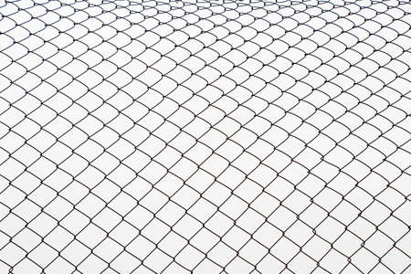 Metal fence background, real fence close-up and texture on the white sky background
