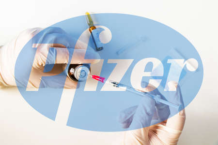 Pfizer's Corona virus and Covid - 19 new vaccine in ampules, vaccine of company Pfizer.のeditorial素材