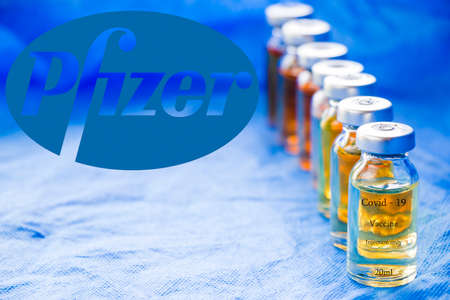 Pfizer's Corona virus and Covid - 19 new vaccine in ampules, vaccine of company Pfizer.のeditorial素材