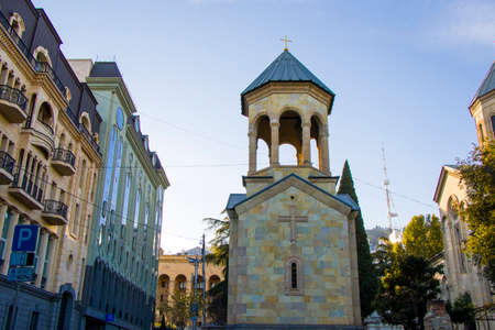 Tbilisi, Georgia - November 24, 2020: Kashveti church in the city center and museum building...