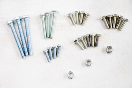 Bolts on the white background, building material