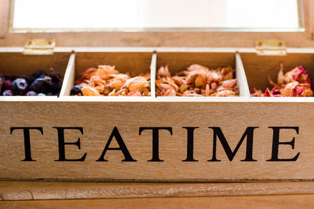 Herbal tea in the wooden box, dry flowers and plants, close-upの写真素材