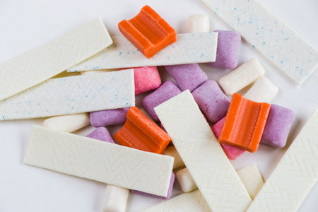 Different chewing gums on the white background, colorful