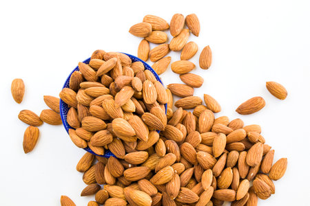 Almonds on the white background, walnut snack, high angle viewの写真素材