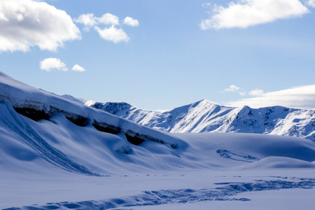 Snowy mountains landscape in Gudauri, Georgia. Sunny day.の写真素材