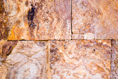 Old stone wall background and texture, church facadeの写真素材