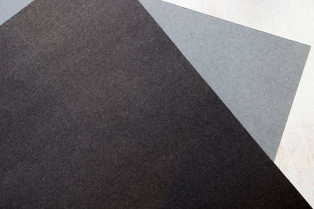 Grey, black and white papers background and texture, pattern of paper, geometric figuresの写真素材