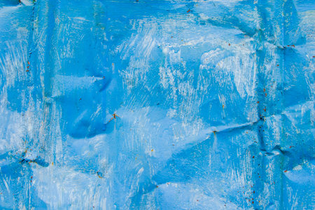 Blue metal fence background, close-up of the colored metal