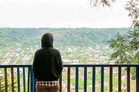 Women with casual cloth looking view of town in Georgiaの写真素材