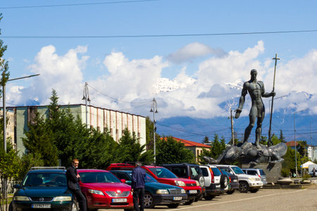 Chkhorostku, Georgia - April 23, 2021: City center situation, people, cars and statueのeditorial素材