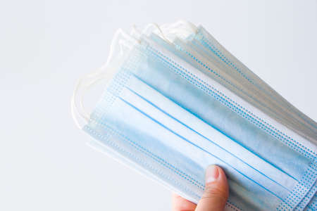 Large group of medical sterile face mask on the white backgroundの写真素材