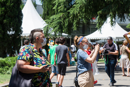 People in the open air marketplace, crowds of people in the park, festival
