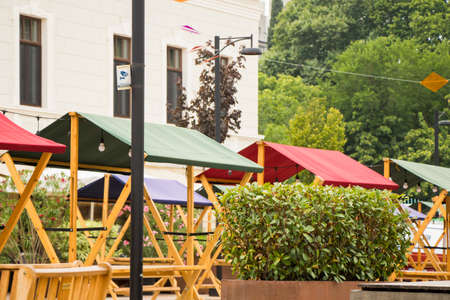 Tbilisi, Georgia - July 11, 2021: Vendors table and tent in festival, open air marketplaceのeditorial素材