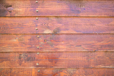 Wooden fence background, red wood material