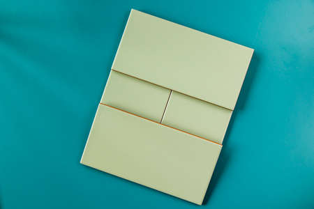 Green ceramic files on the blue background, geometric figure squares